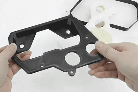 Breakaway support removed from a printed part, leaving a clean surface