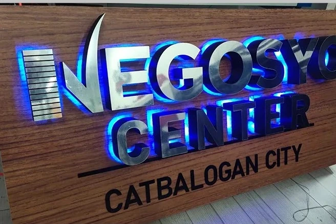 Illuminated NEGOSYO CENTER shop fascia lettering